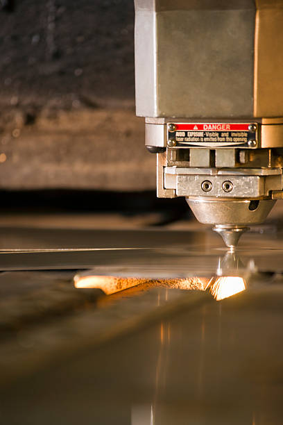 a photograph of a cnc laser, plasma, metal cutting tool in operation.